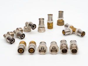 Fitingovy`e детайл за metalloplastikovy`kh trub Снимка - Фитинги за металопластикови тръби