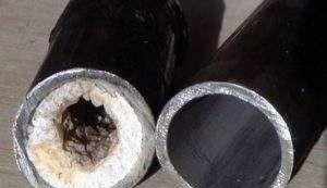 маслена тапа в канализационните тръби Снимка: Маслена тапа в метални канализационни тръби