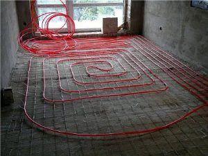 Снимка - Монтаж на тръби за подово отопление.