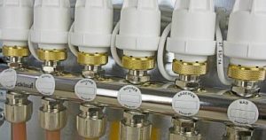 Снимка - Колектор за подово отопление със серен задвижващ механизъм