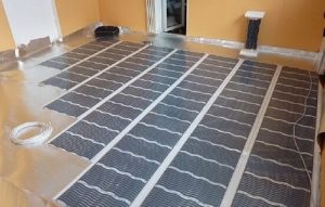 Снимка - монтаж на инфрачервено подово отопление