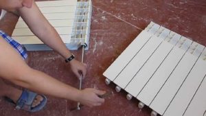 Снимка - монтаж на биметални секции за батерии