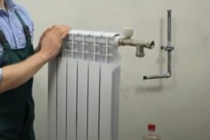 Снимка - Завинтване на устройството в радиатора