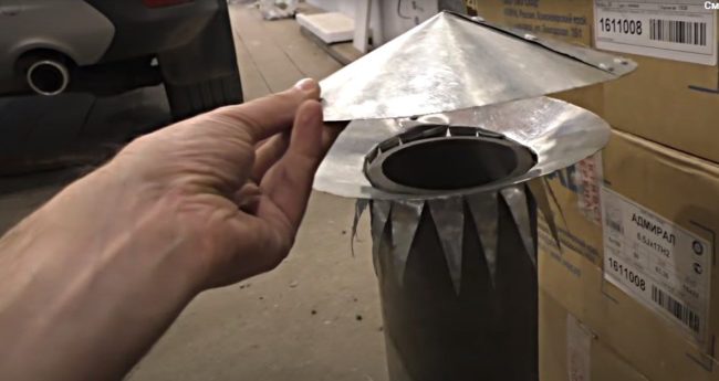 Снимка: Монтиране на долния пръстен с капачка към изпускателната тръба