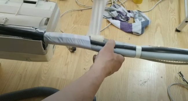 Снимка: Обвързване на комуникации с електрическа лента и фум лента